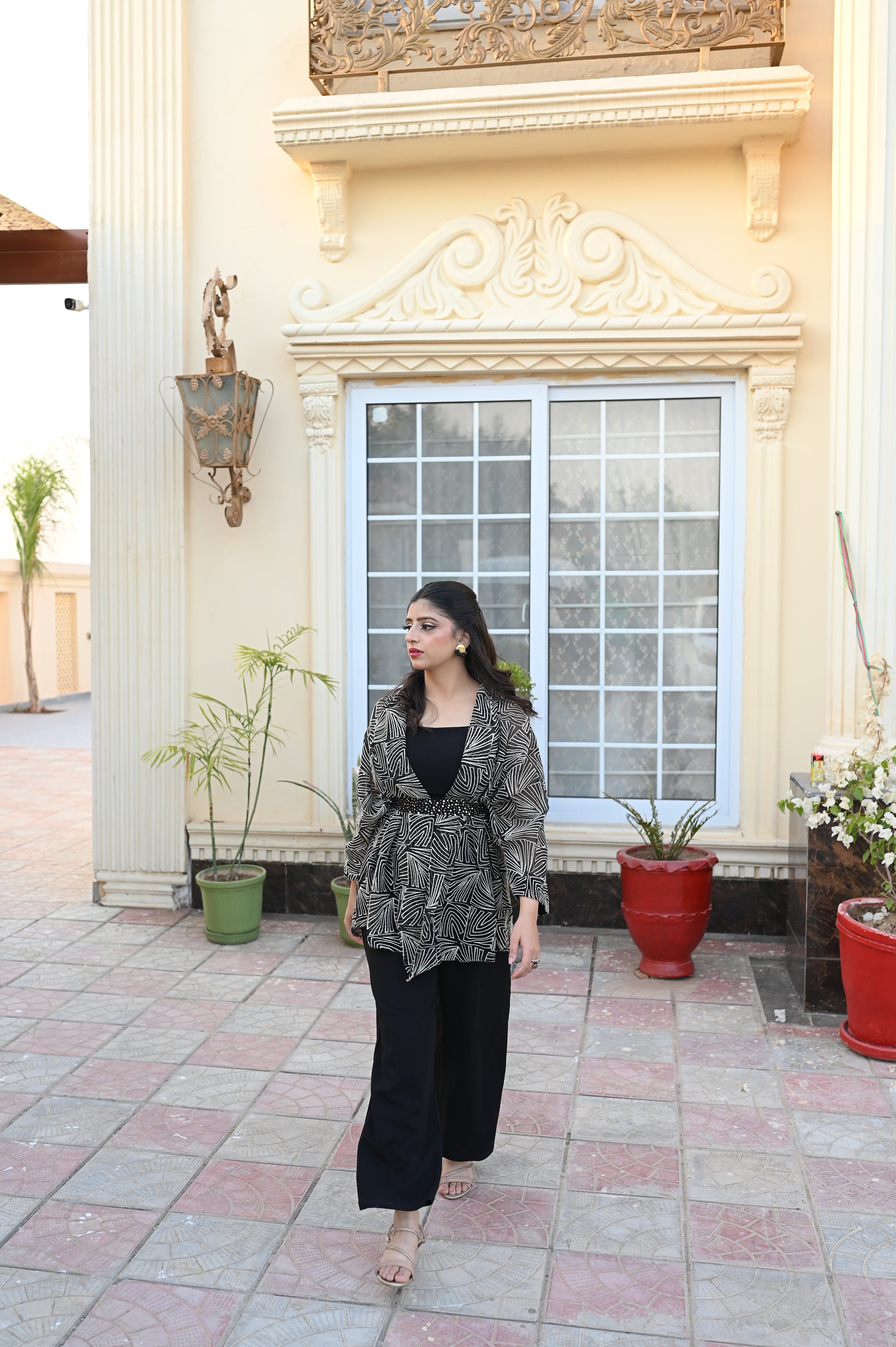 Noir Majesty – Contemporary Black Jumpsuit with Cape & Embellished Belt