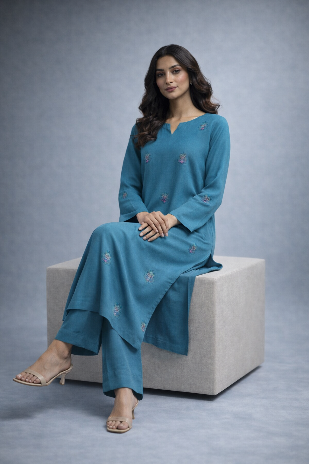 Teal blue embroidered kurta set back view with wide trousers by ISMARA premium Pakistani winter pret