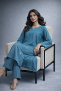 ISMARA teal blue embroidered kurta with straight trousers elegant back profile